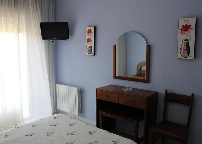 Arco Iris 비야누에바 데 아로사